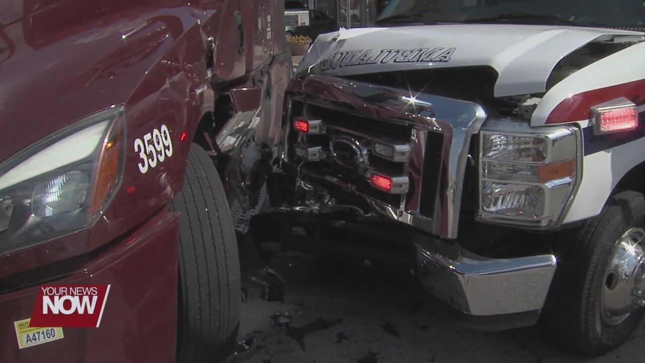 Multiple injuries after a semi-truck vs. ambulance crash